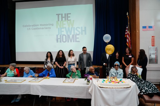 Lillian Hall, 101, prepares to blow out the candles on a birthday cake for 15 centenarians during a birthday celebration for people 100 years old and older at the New Jewish Home in Harlem on Tuesday, Sept. 30, 2025, in Manhattan, New York. (Barry Williams/ New York Daily News)